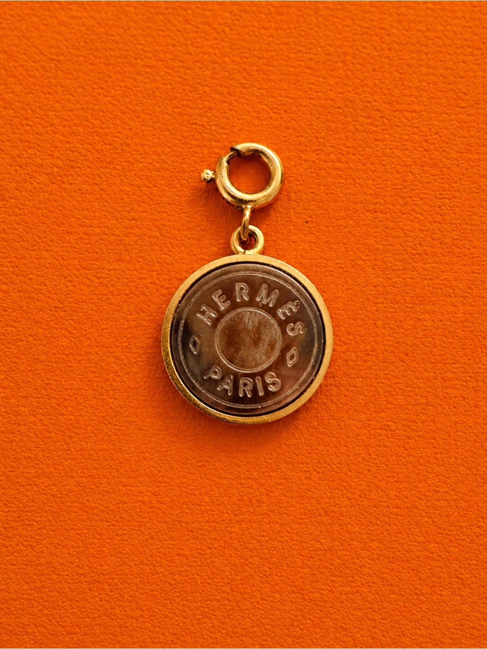 Hermès Paris Round Gold Charm Pendant